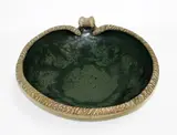 Pacific series bowl by Len Castle, with mottled green glazed interior and textured umber exterior, sold Mar 2015