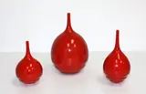John Parker, Three red glazed bottle vases of graduated size