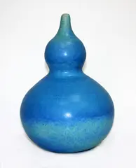 Stoneware gourd form by Len Castle, with barium blue semi matt glaze, sold Mar 2015