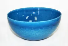 Hemispherical shaped earthenware bowl by Len Castle, with alkaline blue glaze, sold Mar 2015