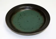 Stoneware bowl by Len Castle, with ash green glaze, sold Mar 2015