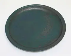 Stoneware dish by Graeme Storm, with blue/green glaze, sold Mar 2015