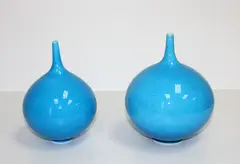 Two porcelain vases by Peter Collis, with spire necks with crackled turquoise glaze, sold Mar 2015