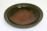 Len Castle, Stoneware bowl, tenmoku glaze with wax resist quince blossom decoration