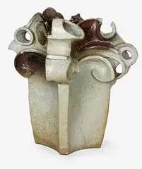 Roy Cowan, Large stoneware garden sculpture, of slab construction, modelled with scrolling apertures, iron glazed
