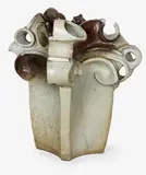 Roy Cowan, Large stoneware garden sculpture, of slab construction, modelled with scrolling apertures, iron glazed