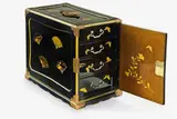 Meiji period (1868-1912) by Large Japanese lacquer kodansu [cabinet], with copper handle and fittings, with black lacquer ground decorated in gold and red hiramaki-e and takamaki-e with fans, offered Jul 2013