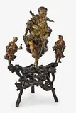 19th century by Large and impressive Chinese rootwood sculpture, depicting the Immortal Li Tieguai holding his crutch in his left hand and a double gourd in his right hand, a bat flying, sold Jul 2013