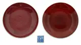 Two Chinese copper red dishes, 18th century, one with Qianlong seal mark