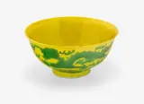 Guangxu underglaze blue six-character mark and of the period (1875-1908) by Chinese yellow ground green enamelled footed dragon bowl, the interior incised with a front-faced dragon, the exterior with a pair of dragons chasing the flaming pearl amongst sc, sold Jul 2013