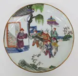 Tongzhi iron-red seal mark and probably of the period (1862-1874) by Chinese famille rose dish, painted with a scene depicting the arrival of travellers, offered Jul 2013
