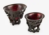 late 17th century by Two rare miniature Chinese cherry amber medicine libation cups, moulded and carved with pine and prunus branches, offered Jul 2013