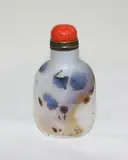 Chinese shadow agate snuff bottle, late 18th/early 19th century, carved in low relief with butterflies and prunus branches, carved footrim, coral stopper