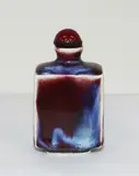 Chinese flambé glazed snuff bottle, probably 19th century, covered in a crackled deep red and bluish-purple glaze