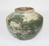 probably Han dynasty (206 BC – AD 220) by Small Chinese iridescent green glazed pottery jar, offered Jul 2013