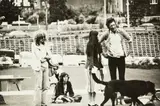 Marti Friedlander, Untitled (A group in the park, including Sam Hunt)