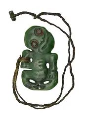 Mike Higgs, A good pounamu Hei Tiki, Kawakawa variety. Modelled with titled head and one three fingered hand place to the abdomen the other to the thigh.