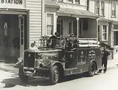 Les Cleveland, Firemen cleaning engine, Thorndon Fire Brigade, Murphy Street Wellington, October 10 1957, gelatin silver print