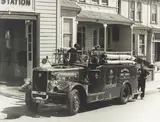 Les Cleveland, Firemen cleaning engine, Thorndon Fire Brigade, Murphy Street Wellington, October 10 1957, gelatin silver print