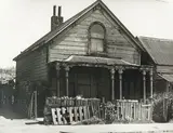Les Cleveland, House Used as Bottle Yard by Indian Dealer, October 10 1957, Tory Street, gelatin silver print