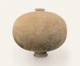 A very large pottery cocoon jar, Warring States (475-221BC), incised with band of geometric design