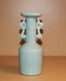 A Chinese Longquan-style celadon, mallet-shaped handled vase, covered with a thick bluish-celadon glaze, the handles moulded as dragons; together with a large Longquan-type cong vase