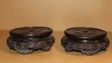 20th Century by A pair of Chinese wood stands, sold Feb 2012
