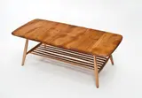 Lucian Ercolani, English 1960's coffee table, in elm with beech base. Manufactured by Ercol and with original blue Ercol label.