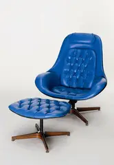 George Mulhauser, American mid century 'Plycraft' Lounger and ottoman, with rare original blue leather upholstery and laminated walnut frame