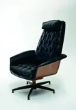 George Mulhaser, Original 1960's plycraft lounger, with a walnut ply frame and black vinyl upholstery