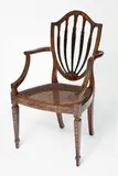 satinwood shieldback painted open armchair by Late 19th century English Hepplewhite Revival, sold Sep 2011