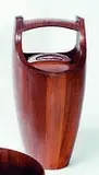 Jen Quistgaard, Staved teak ice bucket, with white plastic interior. Manufactured by Dansk Denmark, with impressed Designers and Makers mark