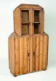 Circa 1910 by A large and impressive German Tramp art cabinet, sold Sep 2011