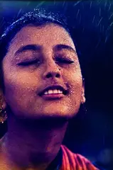 Brian Brake, Indian Girl in Early Monsoon Rains, 1960, 1960, colour photograph printed from Kodak transparency on Ektacolour paper