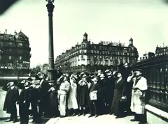 Group Watching the Eclipse, Paris 1911 by Eugène Atget, toned gelatin silver print, photograph taken in 1911 and printed 1956, sold Jun 2011