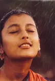 Brian Brake, Indian Girl in Early Monsoon Rain, chromogenic colour print