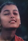 Indian Girl in Early Monsoon Rain by Brian Brake, chromogenic colour print printed from the 4 x 5" colour negative in 1994, sold May 2010