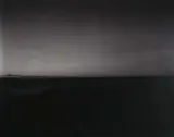 A distant view of Taranaki, at dusk, from the mouth of the Wanganui River, 3 February, 1986 by Laurence Aberhart, 1986, vintage gelatin silver print, sold Sep 2008