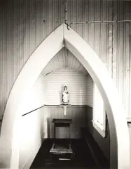 Infant of Prague, Hato Hohera Catholic Mission, Waitaruke, near Kaeo, 20 May 1982 by Laurence Aberhart, selenium and gold toned gelatin silver print (1989), sold Apr 2008