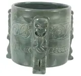 Olive Jones, Cylindrical vase with Maori figural supports