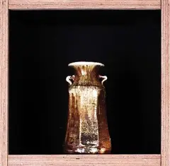 Bruce Martin, Anagama fired, wheel thrown vase with octagonal cut walls. Wood ash glazed.
