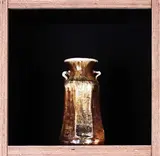 Bruce Martin, Anagama fired, wheel thrown vase with octagonal cut walls. Wood ash glazed.