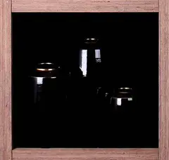 Three graduated shoulder vases by Peter Collis, Black bodied with burnished gold shoulders, sold Oct 2007