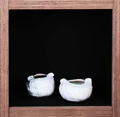 Peter Lange, Two porcelain squat circular vessels with wrythen fluted walls