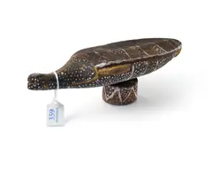 Long Neck Tortoise by Paddy Freddy Puruntatameri, Natural Earth Pigments on Ironwood, sold May 2025