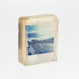 Anssi Kasitonni, Matkamuisto (Souvenir), Polaroid picture embeded in acrylic