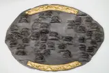 Eva Kmentová, Mouth, cast after the artist's death from the original relief from 1974, lead, tin, gold