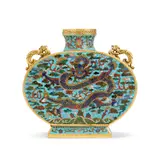 The ewer is of rounded form, with a circular mouth, short neck, and a compressed globular body, raised on a rectangular foot. The shoulders are set with a pair of gilt-bronze beast-form handles. The body is decorated with a front-facing dragon motif. The interior of the foot is engraved with a four-character mark in regular script reading Qianlong nian zhi. by A Chinese Cloisonne Enamel Dragon Vase, Bianhu, Qianlong Incised Four-Character Mark And Of The Period, sold Jun 2026
