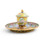overall 13.5cm high; cup: 9cm high; saucer: 16.5cm diameter by A Chinese Painted Enamel Floral Cup With Cover And Saucer, Qianlong Mark, Qing Dynasty, sold Jun 2026