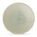 A similar bowl sold at Christie's New York, 22 Mar. 2024, lot 929. by Southern Song Dynasty A Chinese Foliate Rim Carved Qingbai 'Lotus' Dish, drawing, sold Nov 2025